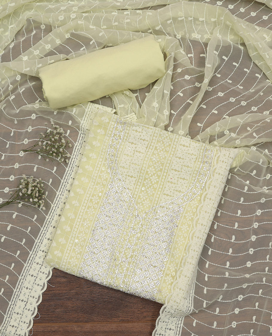Light Yellow Material Chudidar Set, Prettified with Chikankari-Style Embroidery and Neck Stone Work on Georgette Top, a Plain Santoon Bottom, and Paired with a Floral Vine Embroidery Georgette Dupatta