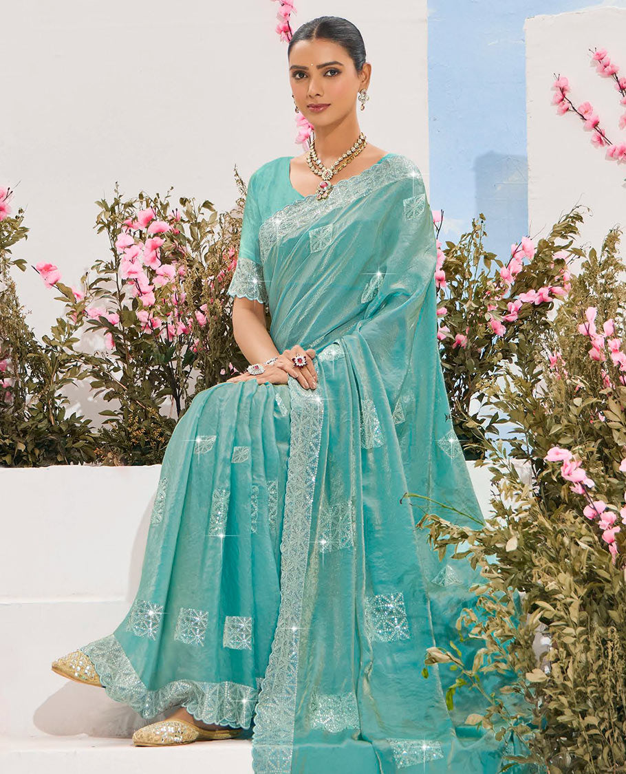 Turquoise stone embroidered designer saree, scallop border, and embroidered pallu