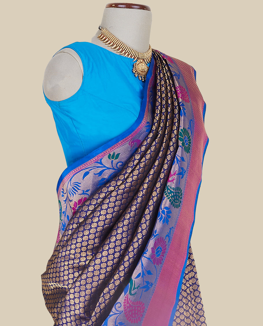 Dark blue gadwal saree with all-over floral buttas, contrast border & pallu of peacock , paisley & intricate floral ogee