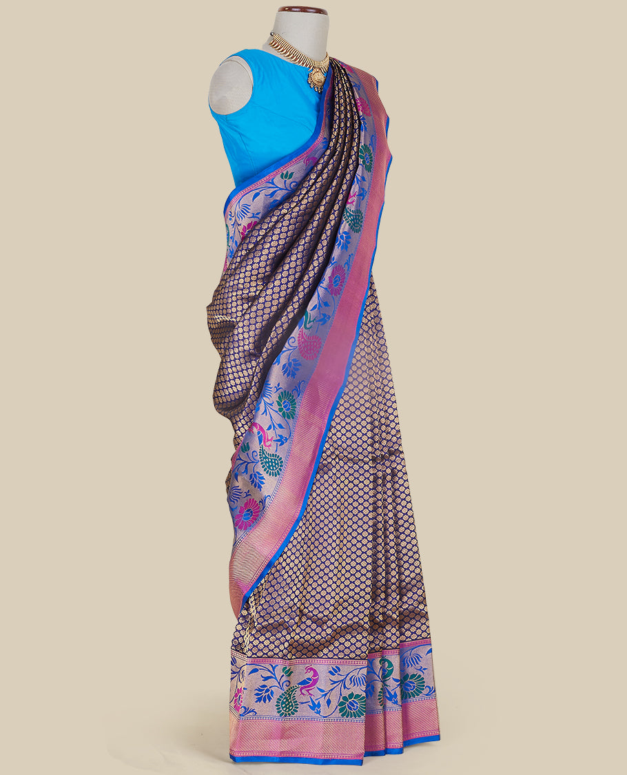 Dark blue gadwal saree with all-over floral buttas, contrast border & pallu of peacock , paisley & intricate floral ogee