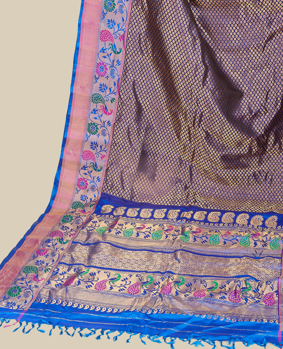 Dark blue gadwal saree with all-over floral buttas, contrast border & pallu of peacock , paisley & intricate floral ogee
