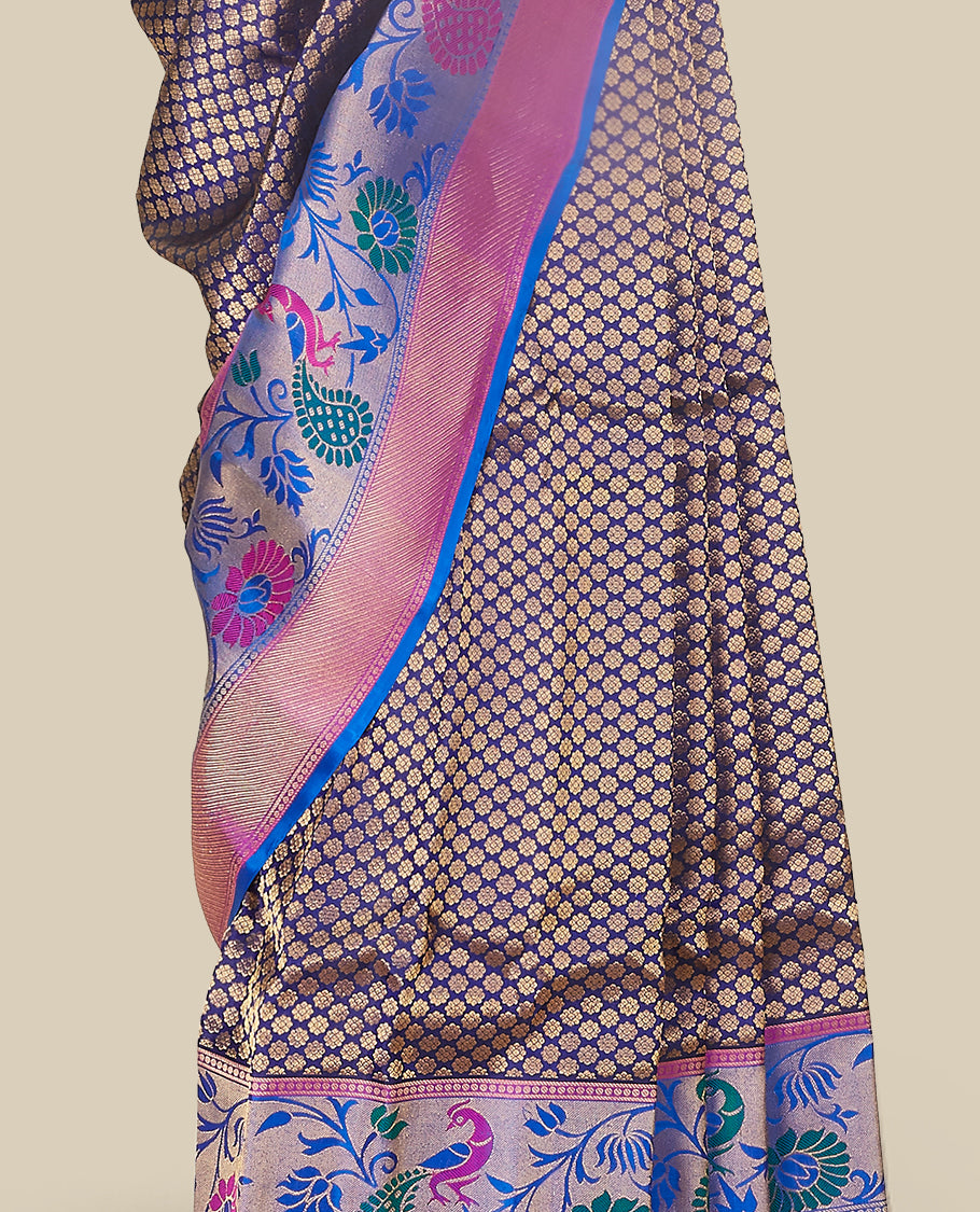 Dark blue gadwal saree with all-over floral buttas, contrast border & pallu of peacock , paisley & intricate floral ogee