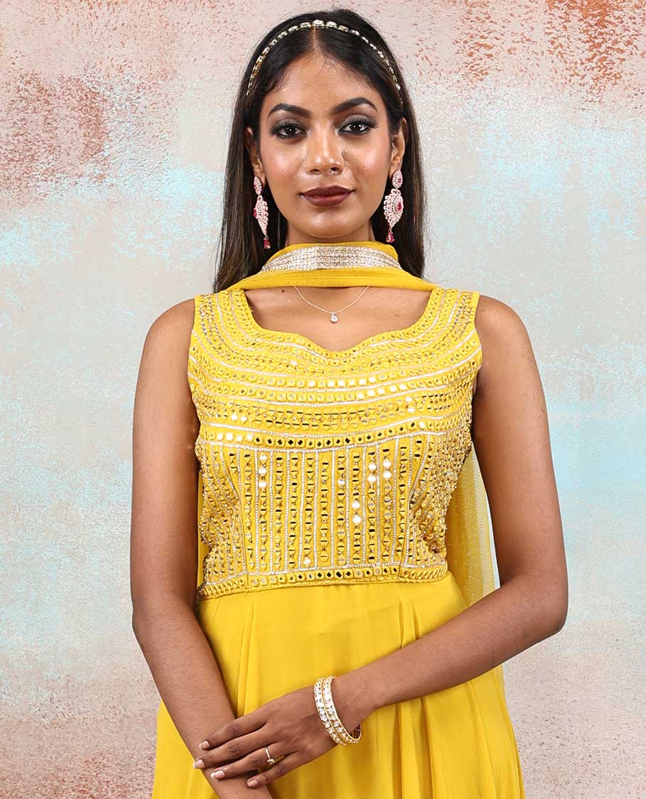 Bright yellow color Georgette Anarkali with full-front next mirror embroidered & net dupatta with embroidered border