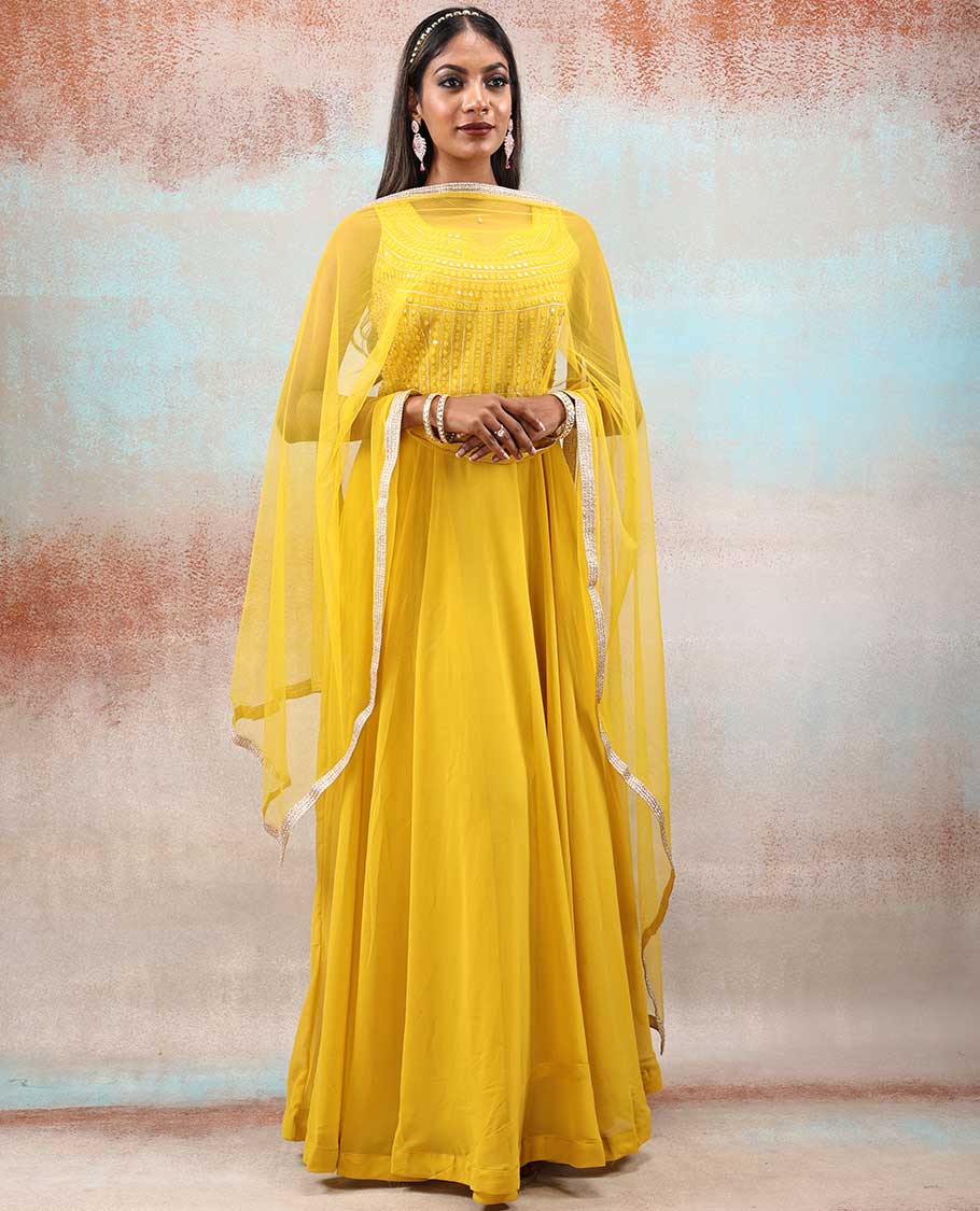 Bright yellow color Georgette Anarkali with full-front next mirror embroidered & net dupatta with embroidered border