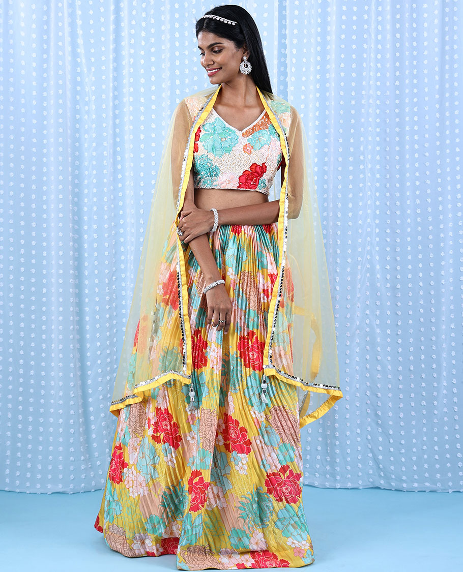 Yellow printed chiffon readymade lehenga with colorful floral skirt,V-neck sequin & sugar bead crop-top & net dupatta