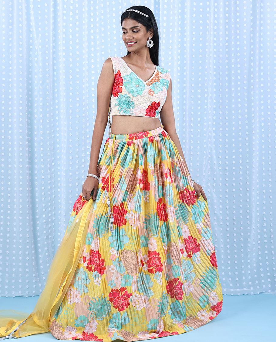Yellow printed chiffon readymade lehenga with colorful floral skirt,V-neck sequin & sugar bead crop-top & net dupatta
