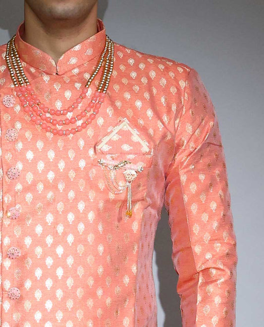 Pale orange pure silk nawabi suit features intricate jacquard design full-sleeve kurta & contrast patiala-style pants