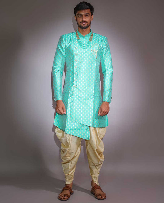 Green pure silk nawabi suit features intricate jacquard design full-sleeve kurta & contrast patiala-style pants