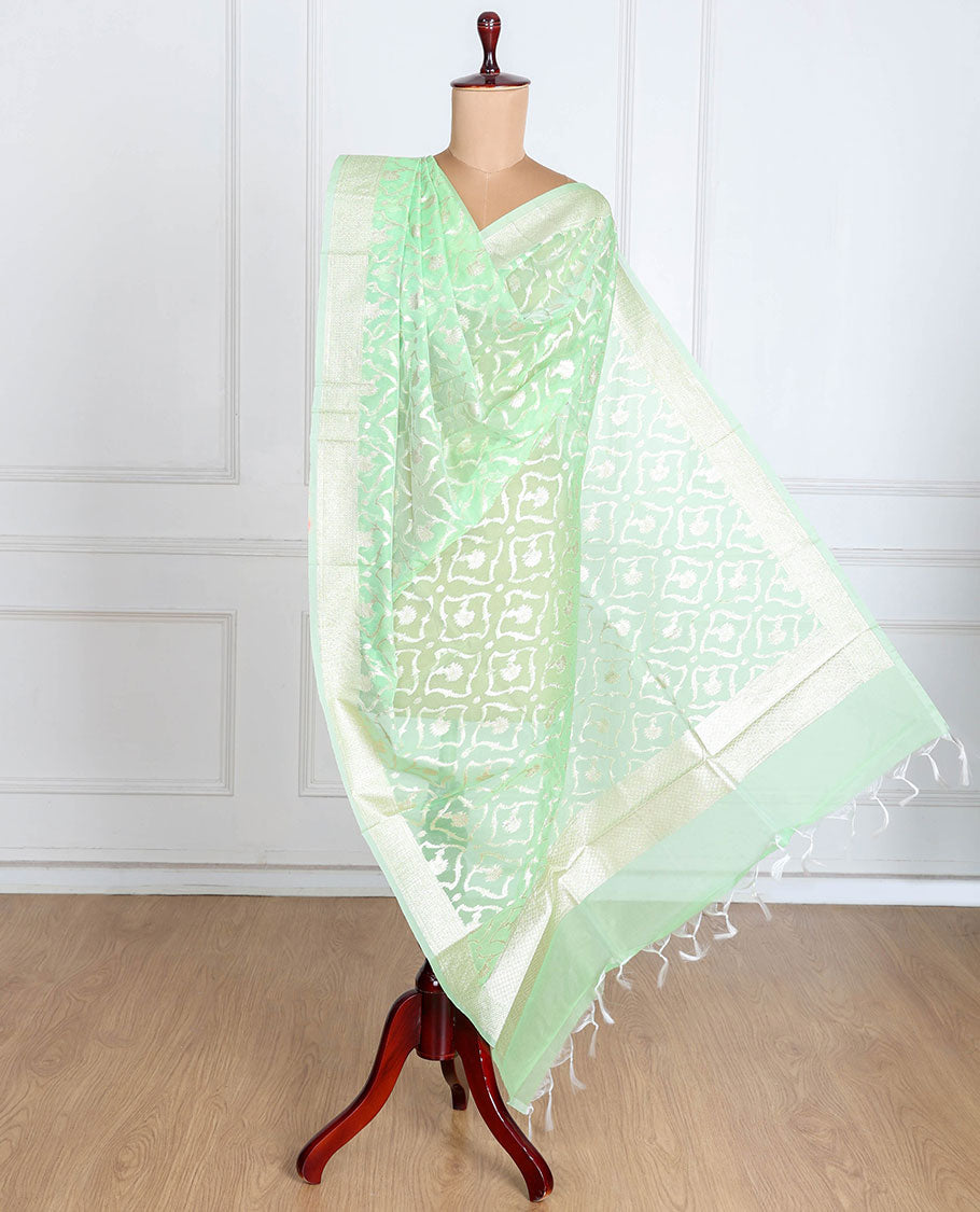 Lite pistachio green Banaras-style organza dupatta features floral jaal designs with tassels