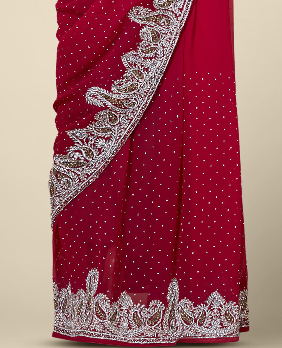 Purple embroidered georgette saree with crystal stone on its body & pallu, white & gold stone paisley border