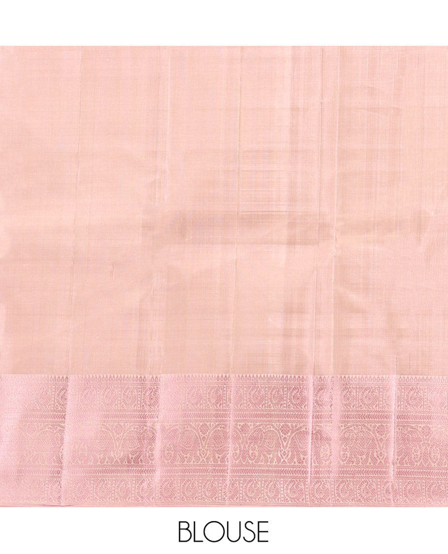 Pale Green Kanchipuram Designer Silk Saree, Subtly Sparkled With Buttas All Over Its Body Complemented by Contrast Traditional Designs Threaded Border, Subtly Woven Pallu, and Paired with a Contrast Blouse