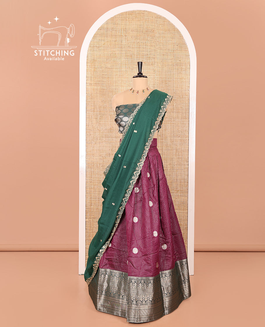 Purple and Green Banarasi Silk Half-Saree Featuring Micro-Checks and Chakram Buttas Woven Skirt, Complemented by Contrast Traditional Zari Design Border, Paired with a Jacquard Blouse, and a Rangoli Georgette Embroidered Dhavani