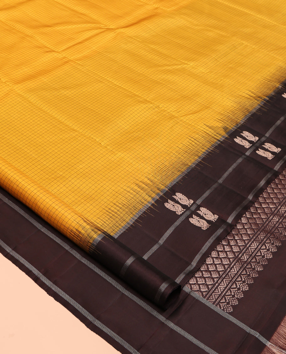 Yellow Checked Kanchipuram Silk Saree, a Contrast Border of Peacock Buttas, Grand Jaal Pallu, and a Contrast Blouse