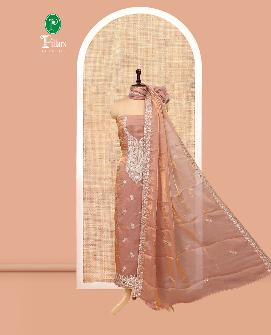 Peach Fendy Organza Material Chudidar Set, Adorned with Neck Embroidered Top, a Santoon Bottom, and a Embroidered Dupatta