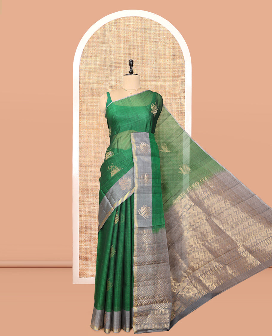 Green Cotton Saree, Enhanced with a Zari Buttas, Complemented by One-Side Zari Motif Border, a Contrast Chevron Pallu, and a Contrast Blouse