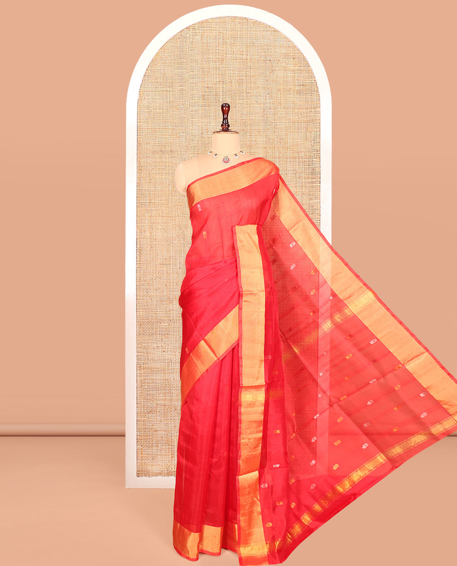 Red Uppada Silk Saree, Spotlighted with Buttas, Highlighted by a Zari Border, Zari-Woven Pallu, and a Matching Blouse