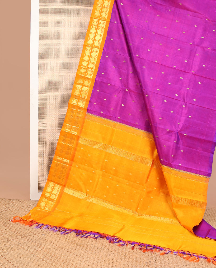 Purple buttas kancheepuram silk saree with contrast korvai border of thilakam mokku, paun design & zari design pallu