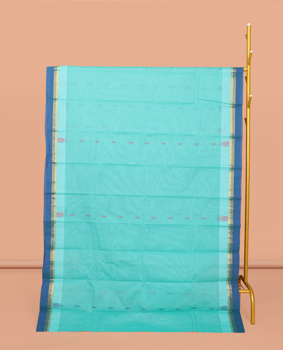 Blue Kanchi Cotton Saree, Decorated with Buttas All Over Its Body, Complemented by a Contrast Border, Pallu of Paisley Design, and Paired with a Matching Blouse