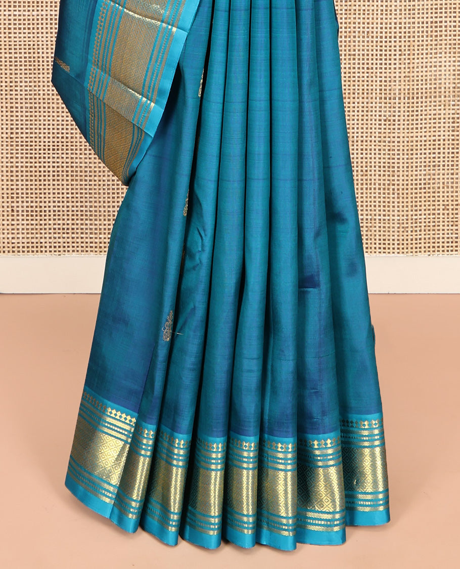 Blue Kanchipuram Silk Saree, Adorned with Zari Buttas, Complemented by a Contrast One-Sided Border of Panner Sombu, Banaras, Muthu, and Mayil Kann Designs, Grand Pallu, and No Blouse