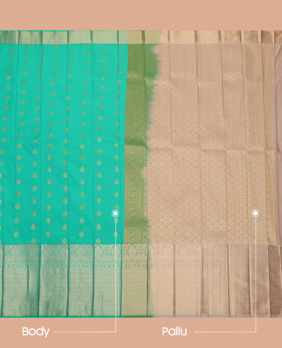 Green Budget Silk Saree, Mesmerized with Zari Buttas All Over Its Body, Complemented by Contrast Traditional Zari Designs Woven Border, Grand Pallu and Paired with a Contrast Blouse