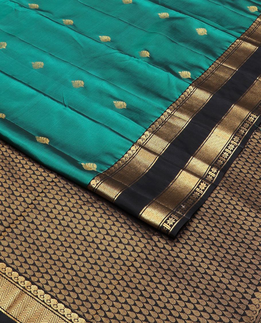 Green zari buttas vasundhara silk mix saree, contrast thilakam motif pallu & rettai pettu border of salngai,vanki,mayil kann & star kamalam