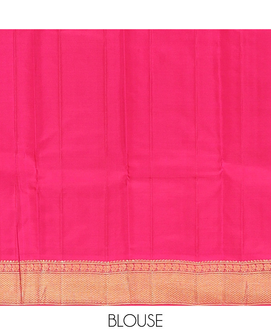 Orange Kanchipuram Silk Saree Decked Up with Zari Buttas, Complemented by Contrasting Border of Rekku, Banaras, Mayil, and Mayil Kann Designs, Pallu Mirroring the Same Border Design, and Paired with a Contrast Blouse