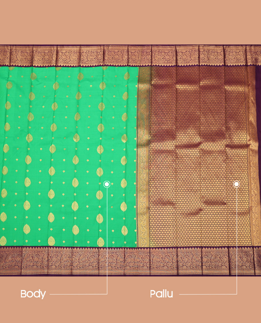 Green Budget Silk Saree, Elevated with Zari Buttas All Over Its Body, Complemented by a Contrast Traditional Zari Border of Paisley Designs, Grand Jaal Pallu, and Paired with a Contrast Blouse