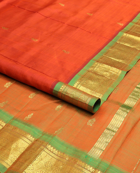 Orange zari buttas Kanchipuram silk saree, contrast one-sided border of thilakam mokku,banaras & jaal & zari design pallu