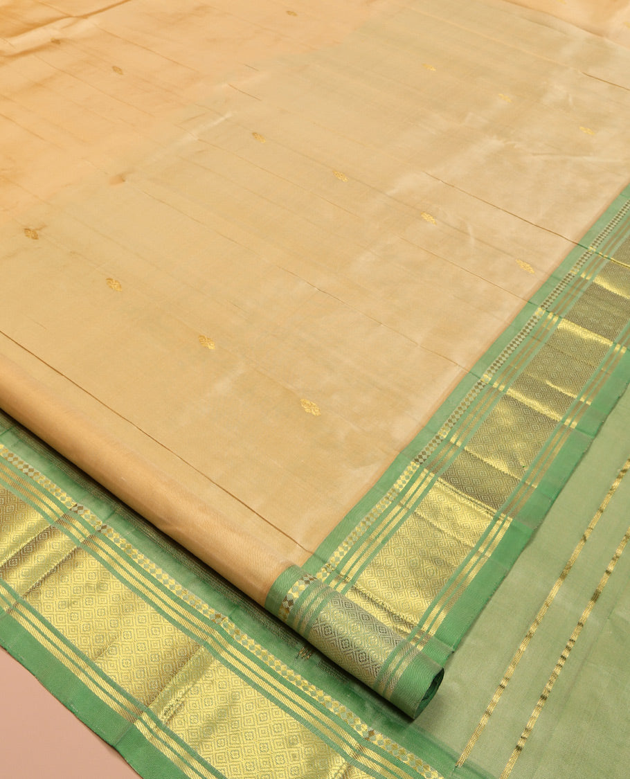 Sandal Kanchipuram Silk Saree, Sparsely Sparkled with Zari Buttas, Complemented by a Contrast One-Sided Border of Panner Sombu, Banaras, and Jaal, Floral Design Pallu, and No Blouse