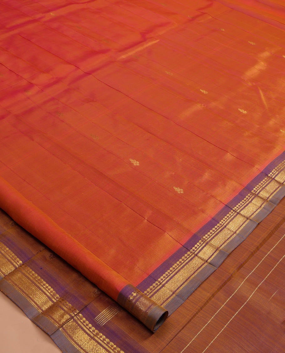 Rust Kanchipuram Silk Saree, Adorned with Zari Buttas, a Contrast One-sided Border of Panner Sombu, Banaras, and Jaal Designs, Zari Woven Pallu, and No Blouse