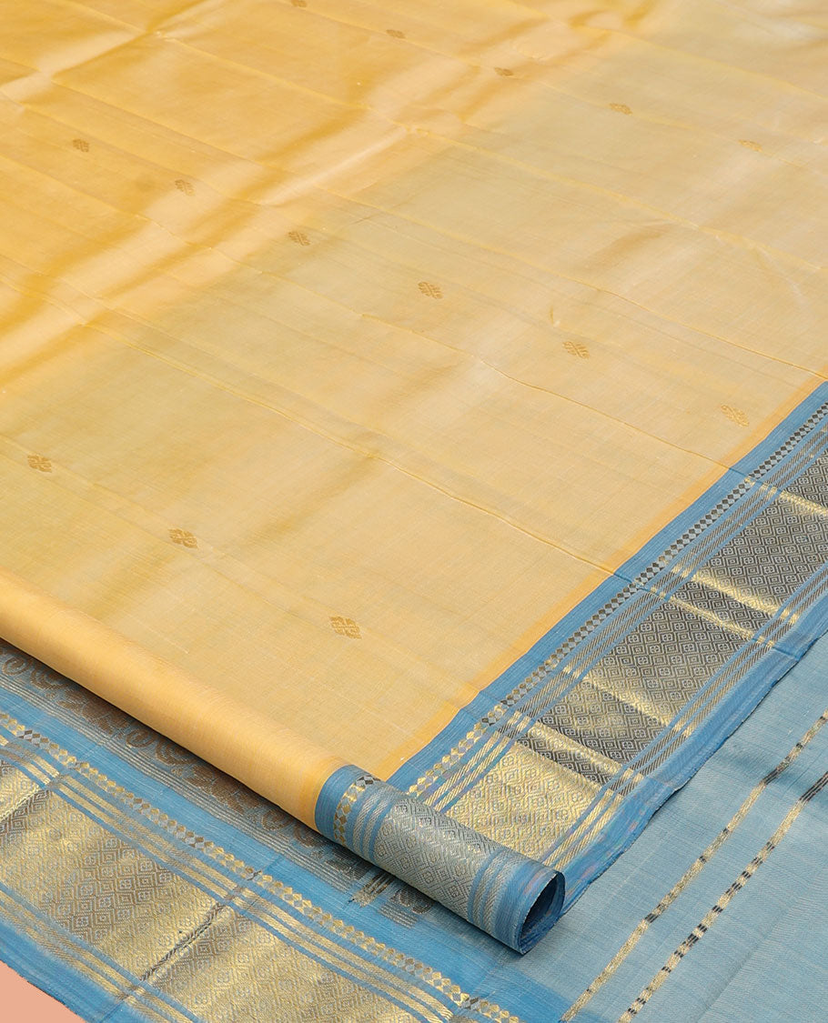 Pale Yellow Kanchipuram Silk Saree, Sparsely Woven with Zari Buttas, a Contrast One-Sided Border of Panner Sombu, Banaras, and Jaal Designs, a Zari Design Pallu, and No Blouse