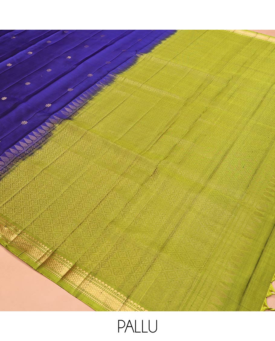 Blue Mayuri Soft Silk Saree, Spotlighted with Zari Buttas All Over Its Body, Complemented by Contrast Border of Salngai, Muthu, Banaras, and Kuyil Kann Designs, Grand Jaal Pallu and Paired with a Contrast Blouse