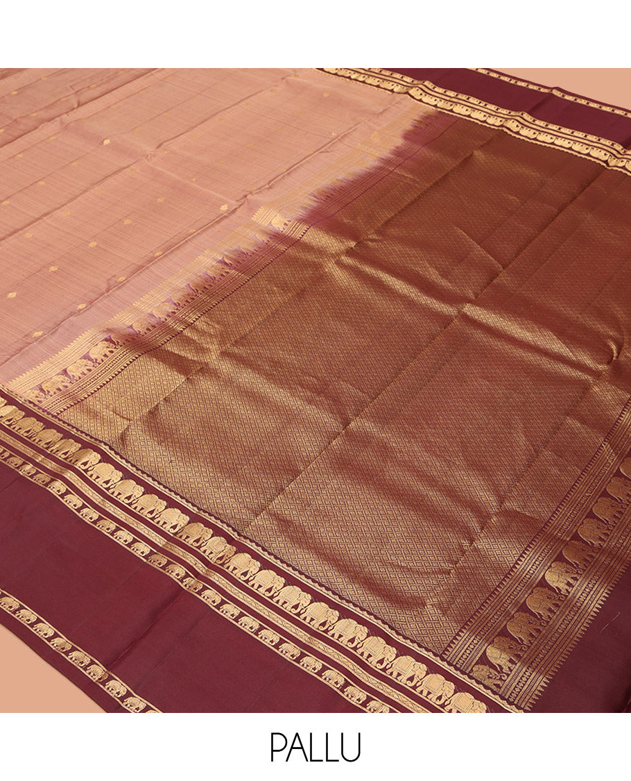 Peach Vasundhara Silk Saree, Adorned with Zari Buttas All Over Its Body, Complemented by a Contrast Rettai Pettu Border of Yaanai Designs, Grand Jaal Pallu, and Paired with a Contrast Blouse