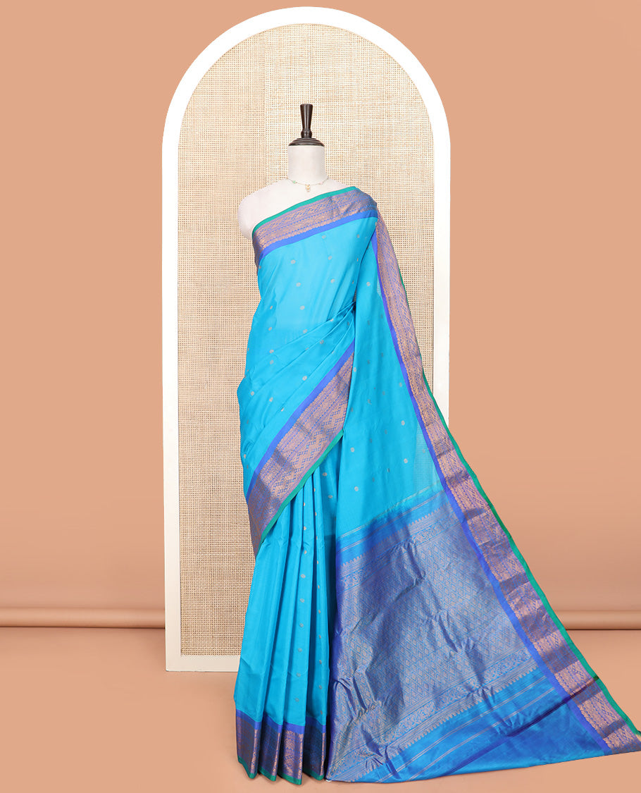 Blue Gadwal Saree Embellished with Zari Buttas, Featuring a Contrast Traditional Motifs Woven Border, Jaal Design Pallu, Along with a Complementing Contrast Zari Bordered Blouse