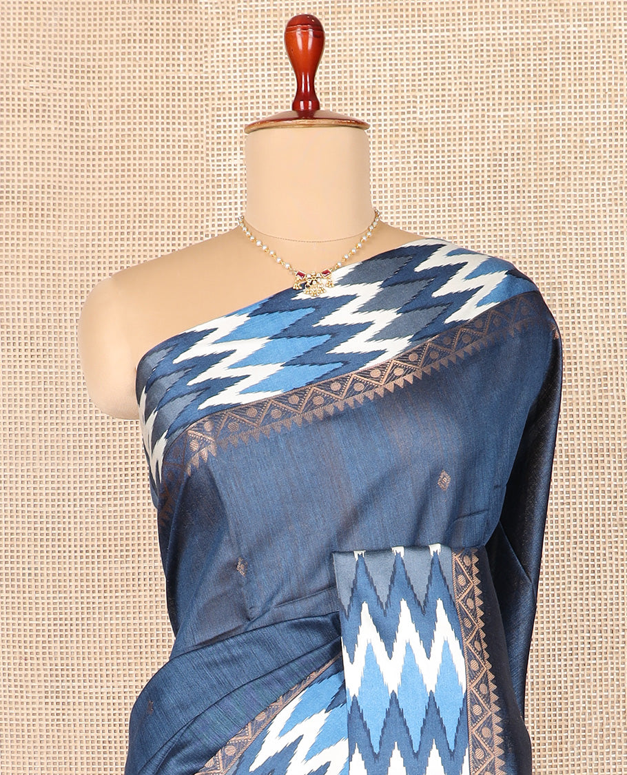 Blue zari buttas tussar silk saree, contrast traditional design with ikkat design border, and self-pallu