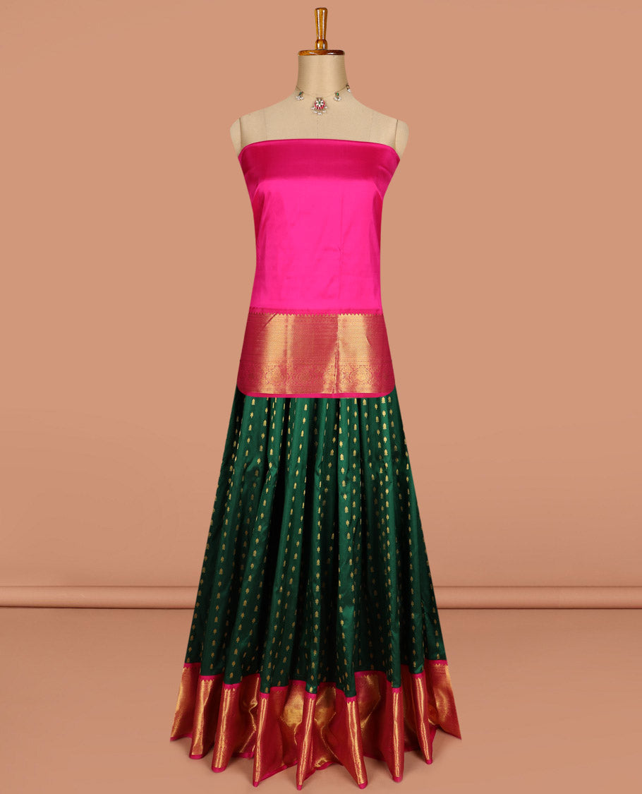 Green pure silk half saree, zari buttas skirt, contrast korvai border of rekku, muthu, laddu kamalam, kuyil kann, and zari designs and jaal pallu