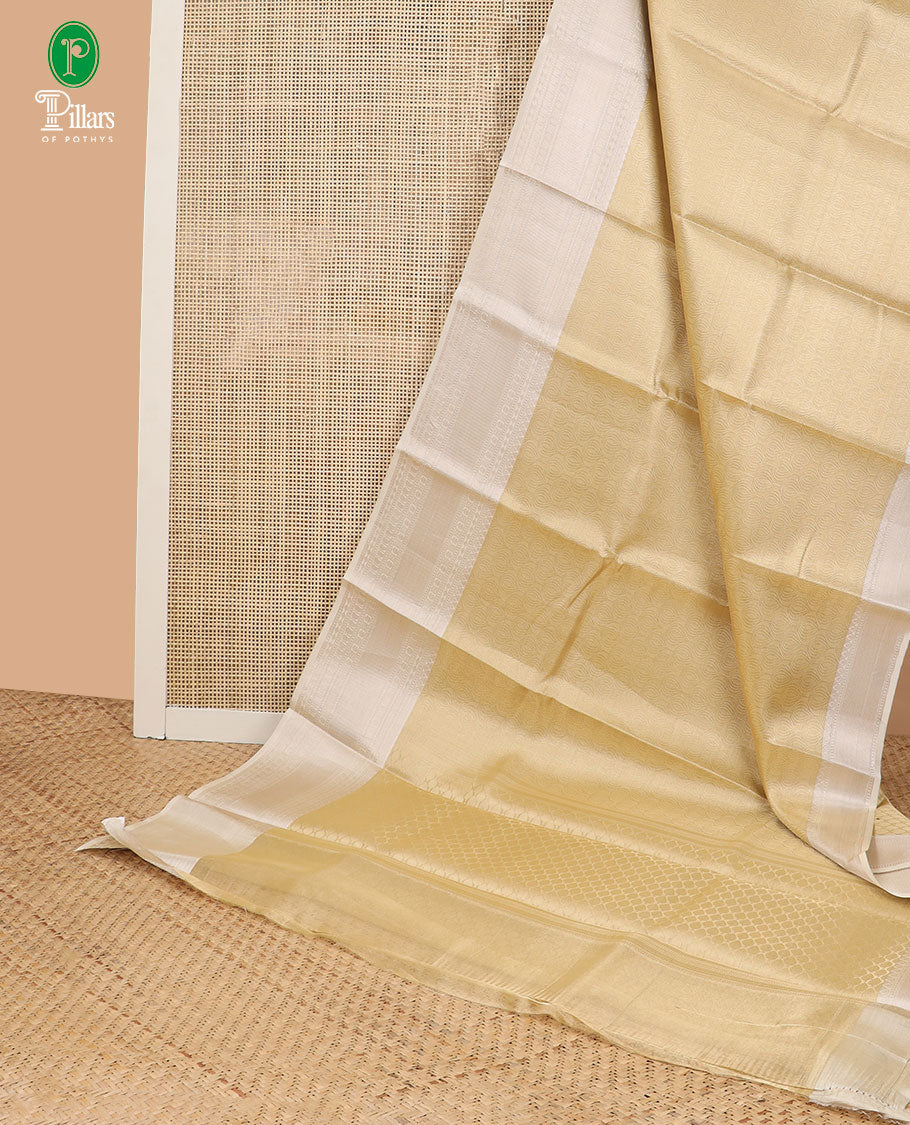 Gold with cream brocade zari weaving design banaras kora tissue saree with contrast zari jacquard border & rich pallu along with brocade blouse