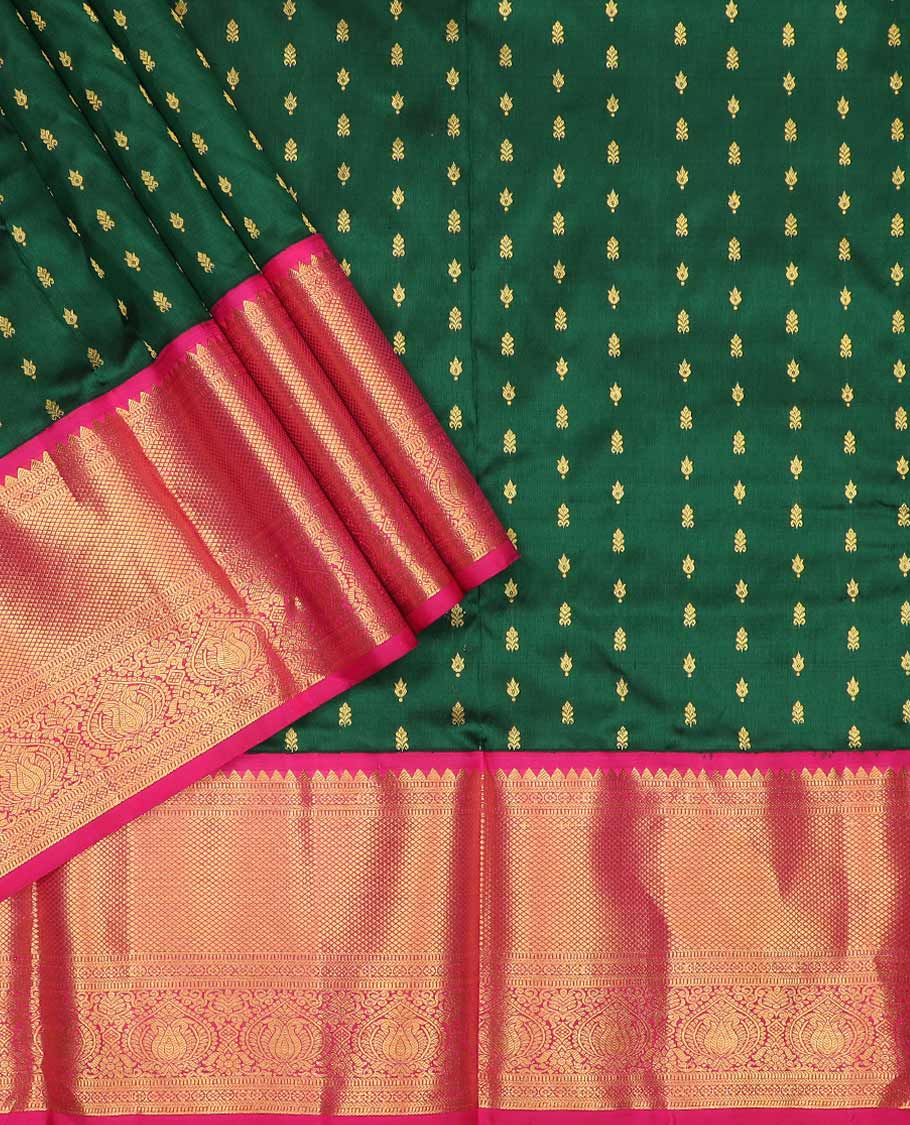 Green pure silk half saree, zari buttas skirt, contrast korvai border of rekku, muthu, laddu kamalam, kuyil kann, and zari designs and jaal pallu