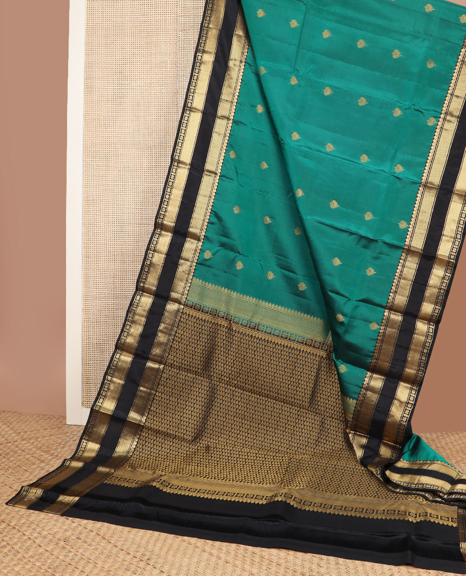 Green zari buttas vasundhara silk mix saree, contrast thilakam motif pallu & rettai pettu border of salngai,vanki,mayil kann & star kamalam