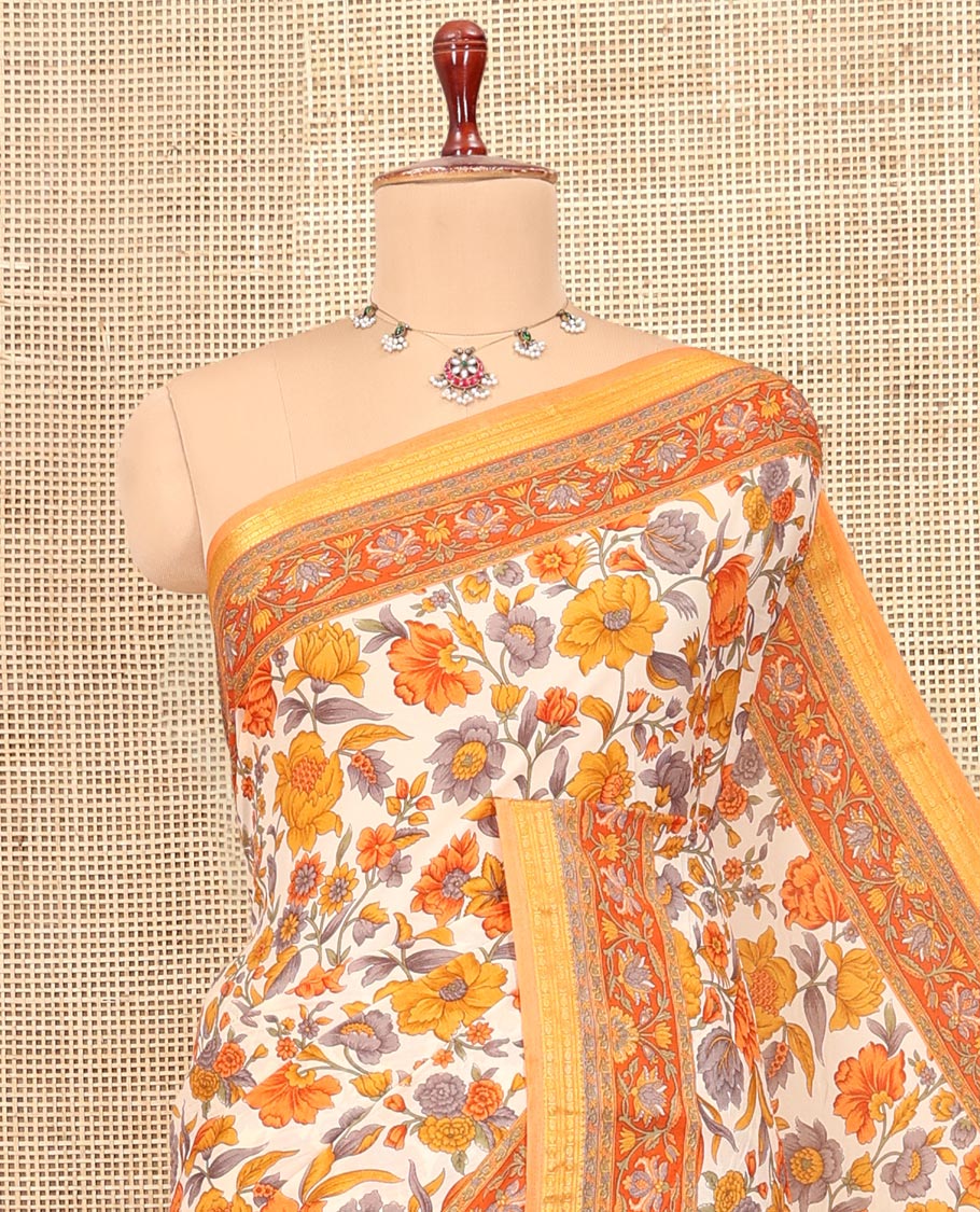Cream-Base Printed Silk Saree Featuring Floral Vine Print, a Contrast Floral Printed Zari Border, Printed Pallu, and a Contrast Blouse