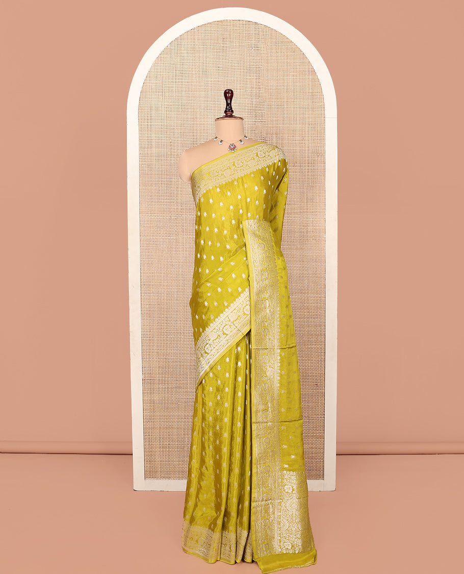Green Fancy Crepe Saree, Finely Crafted with Buttas, Highlighted by a Floral Creeper Border, Intricately Designed Pallu, and a Matching Blouse
