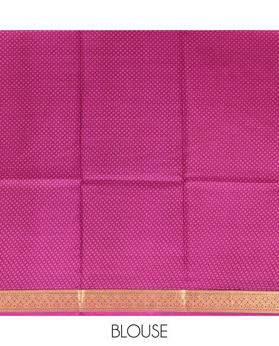 Magenta Printed Silk Saree Features an Intricate Design, a Traditional Zari Border, an Intricate Pallu, and Matching Blouse