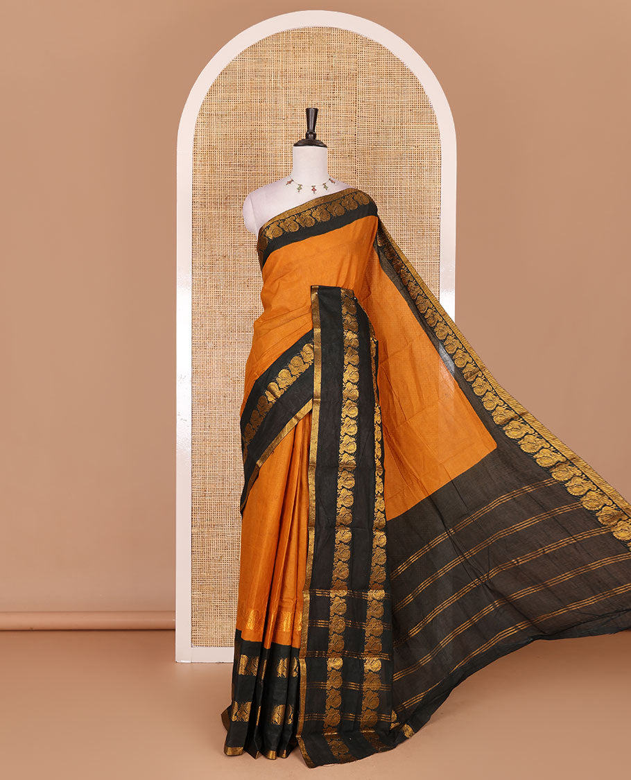Mustard plain sungudi cotton saree, contrast annam motifs, gold zari woven border, zari striped, and zari design contrast blouse