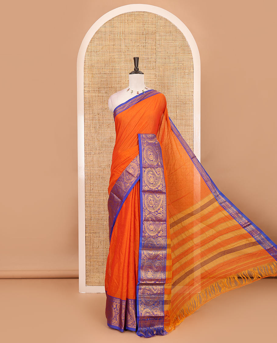 Orange plain design mercerised cotton saree, contrast traditional peacock enclosed manga border, striped pallu & matching blouse