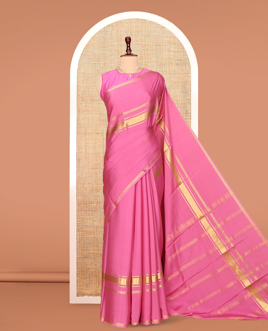 Pink Plain Mysore Silk Saree, Highlighted by Traditional Zari Border of Elephant Motifs, Subtly Zari Striped Pallu, and Paired with a Matching Blouse