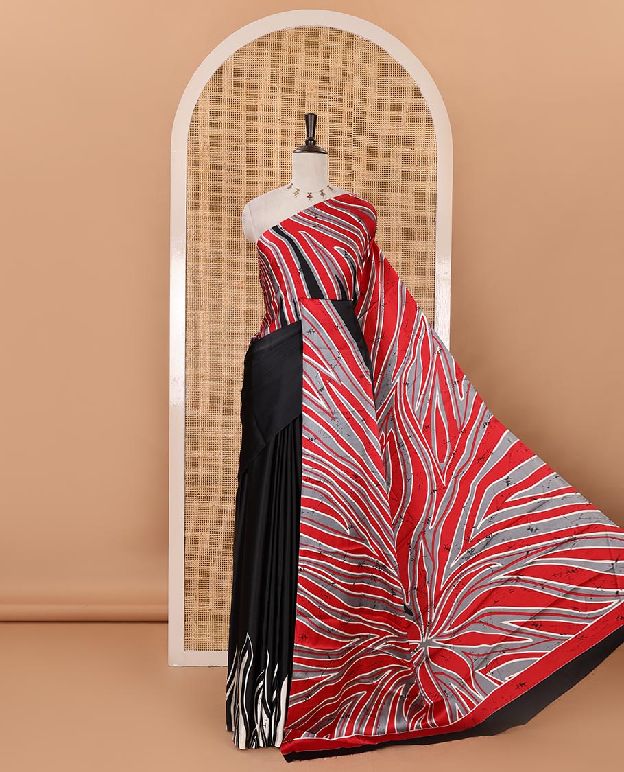 Borderless black-red color batik-style abstract-printed satin crepe saree, contrast-printed blouse