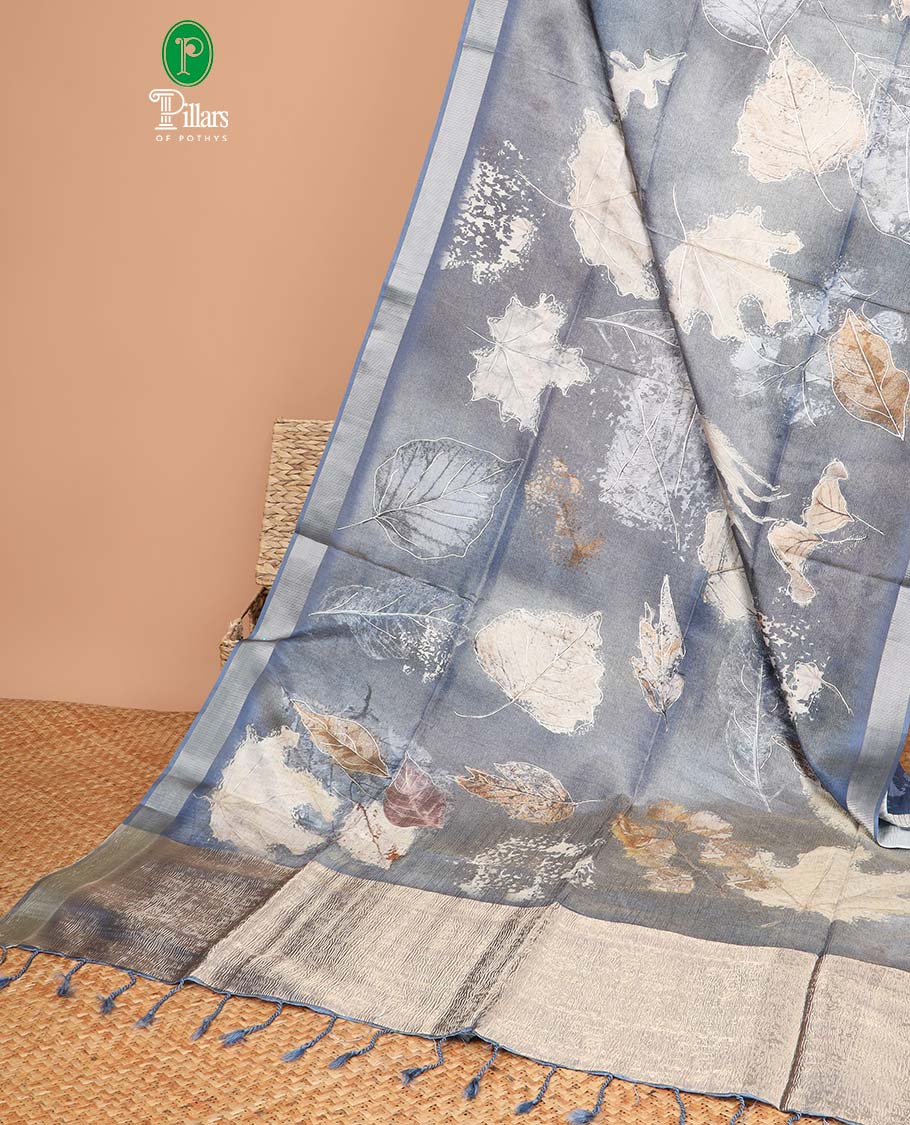 Grey all-over digital print gold foil print crush tissue saree contrast gold zari border & crush pallu along with printed blouse