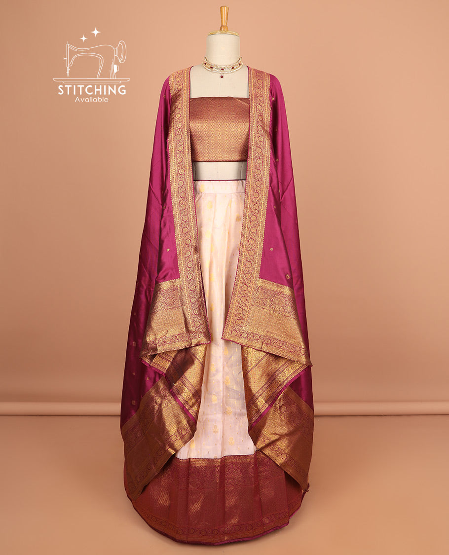 Light pink buttas half saree with contrast zari design border, zari design blouse & floral vine zari design dhavani