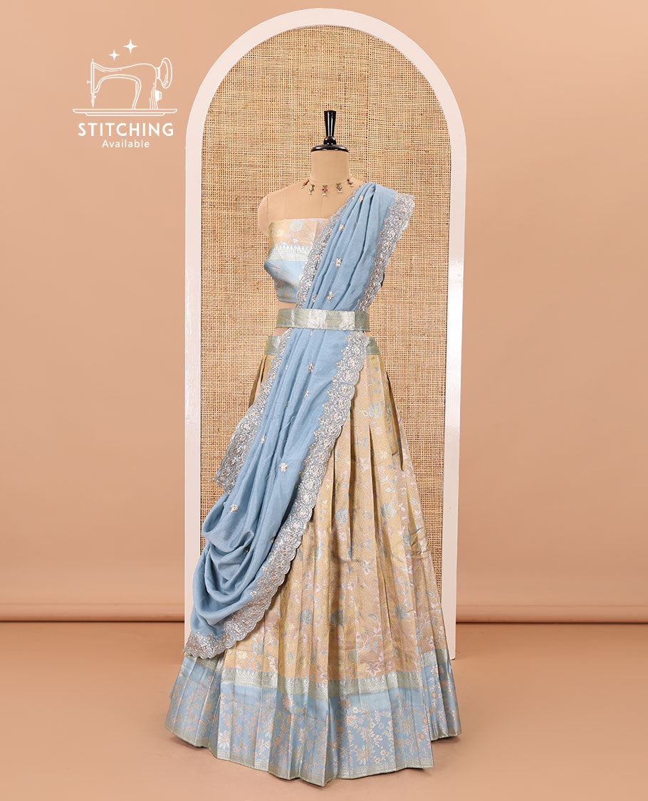 Fawn banarasi half-saree, floral jaal thread weave with contrast floral thread bordered skirt, a matching blouse, and scallop embroidered dhavani with belt