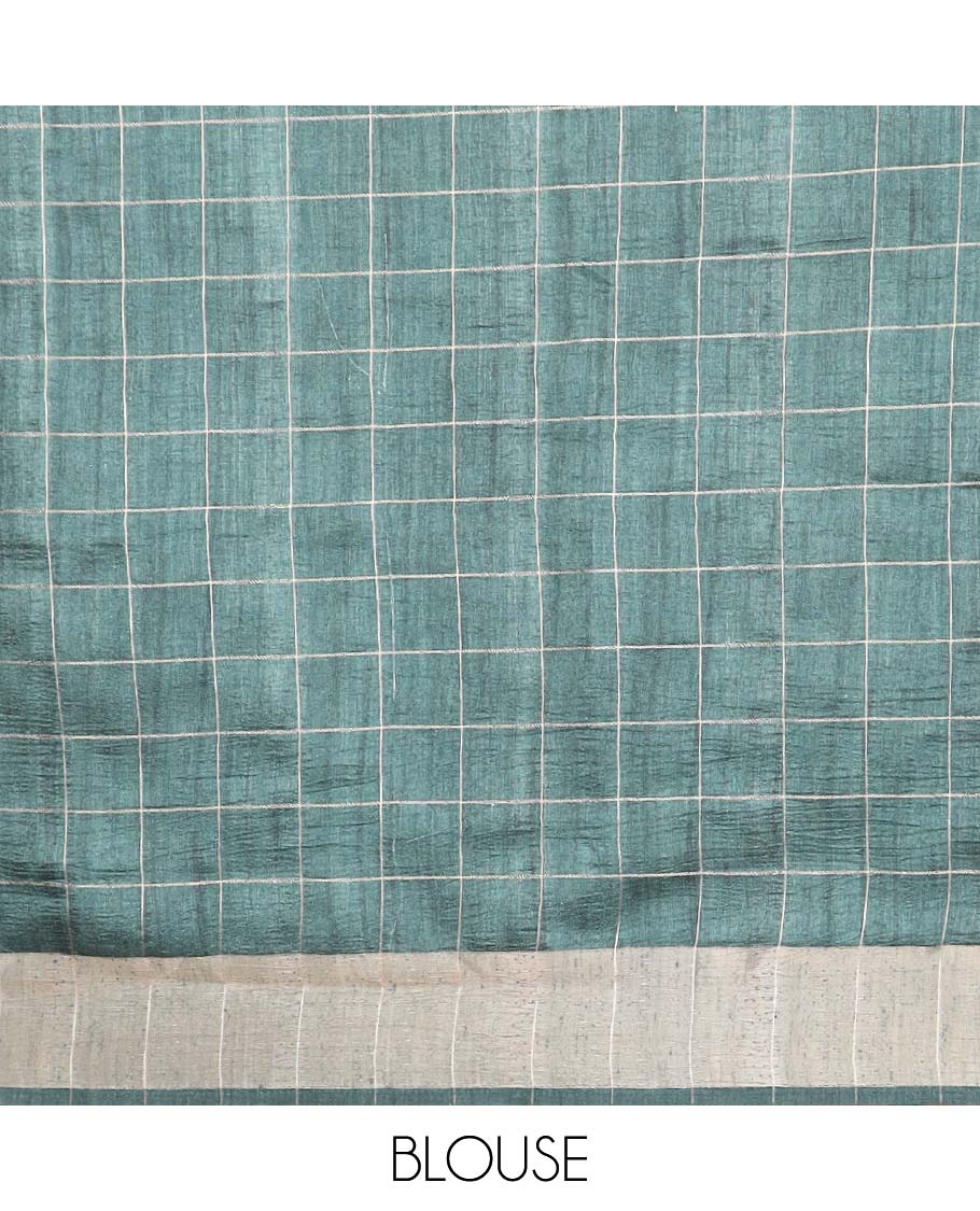 Green checks with floral printe semi tussar saree, gold zari bawanchi border & printed pallu along with checked blouse